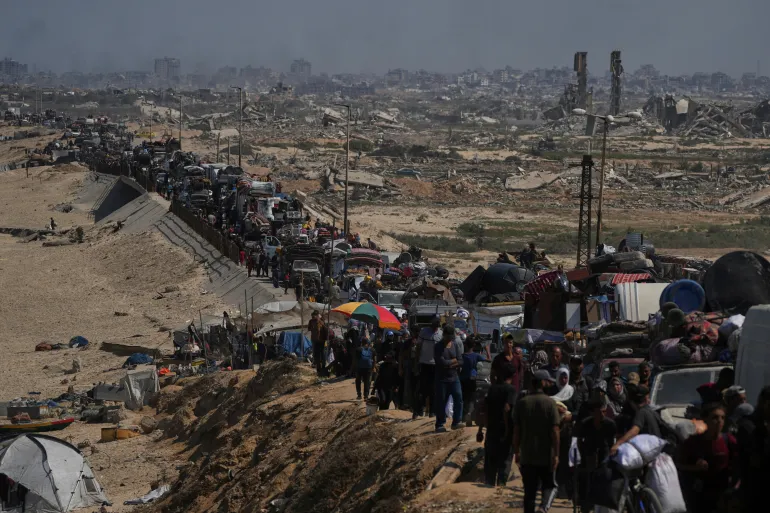 Israel Gaza forced displacement: Thousands flee as airstrikes flatten Gaza City 2 Aerial shot of Gaza City with smoke rising from destroyed blocks.
Alt text: Aerial view showing Israel Gaza forced displacement as smoke rises over destroyed residential blocks in Gaza City.
